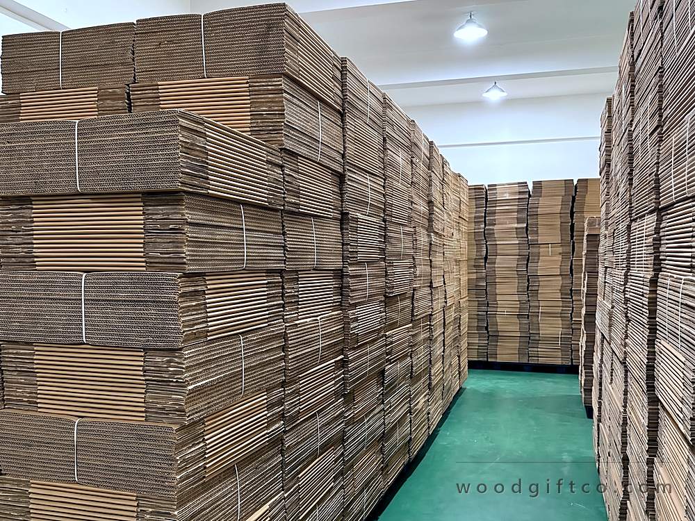 Flat-packed cartons cut and stacked in-house