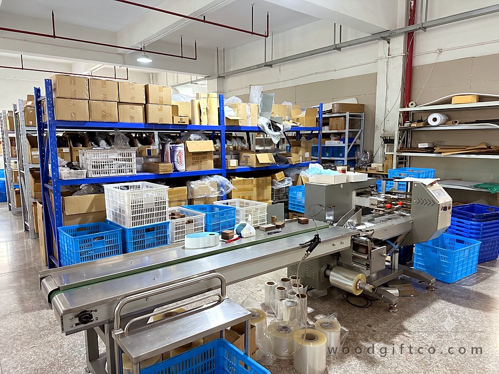Flow-wrap packing machine with film rolls