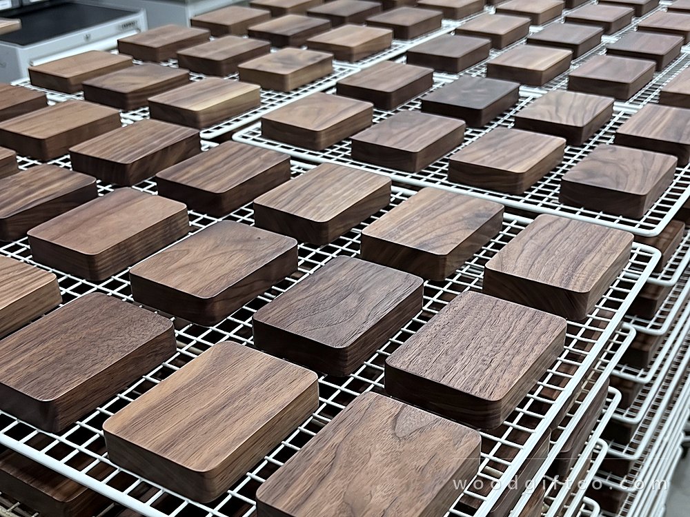 Finished black walnut boxes drying on racks