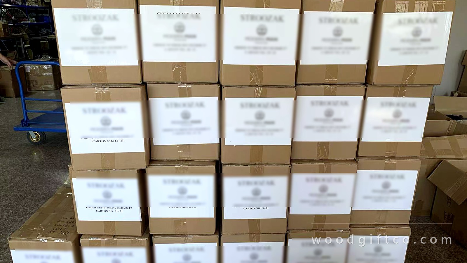 Bulk export cartons ready for collection, shipping marks blurred for customer confidentiality